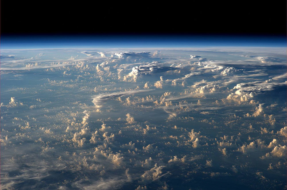 Clouds cast giant shadows into Space from ISS Strange Sounds