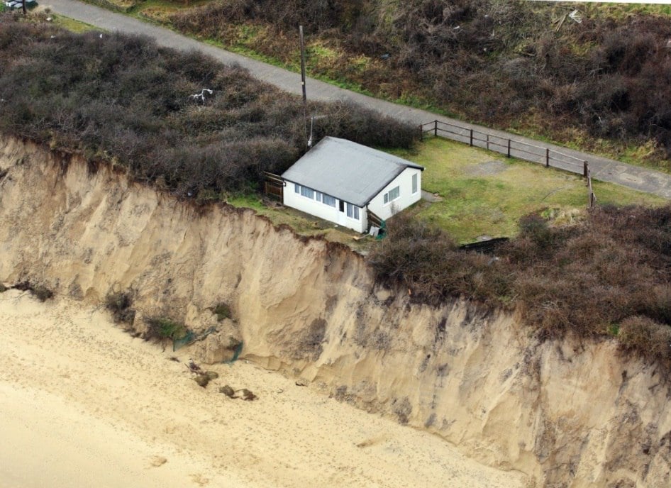 Shocking drone footage of homes falling off cliffs at Hemsby after strong storms in 2018, marrams hemsby house collapse coastal erosion