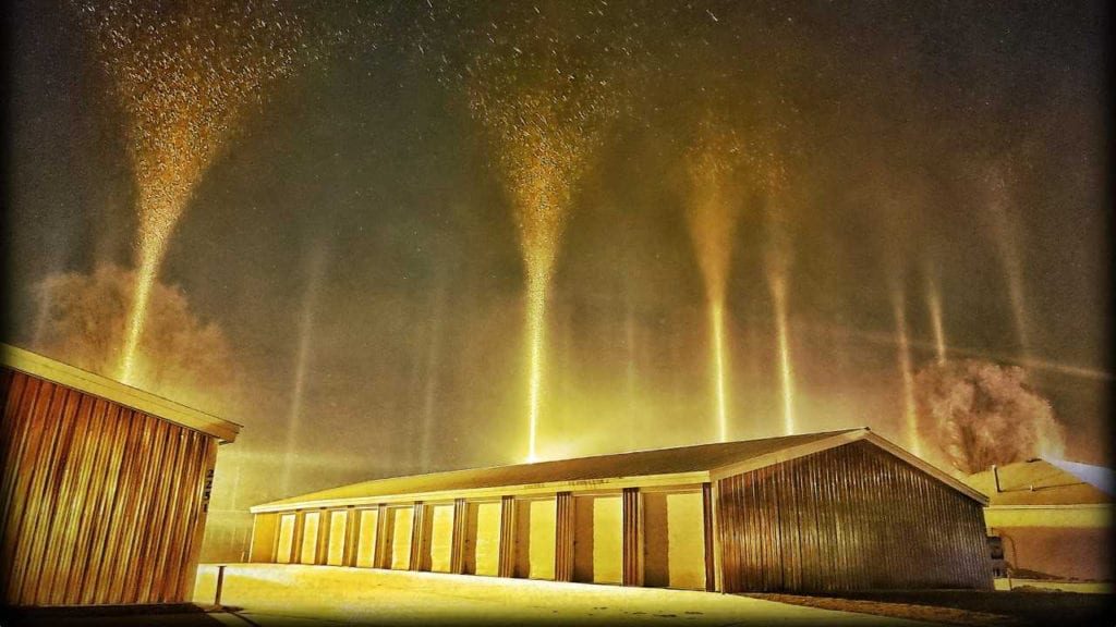 In pictures Extraordinary light pillars cast colorful