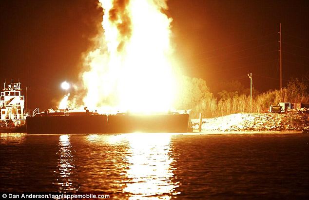 Dangerous: Four explosions took place on two barges on the Mobile River in Alabama at around 10pm Wednesday night, injuring three people