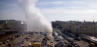 Meanwhile in Russia, a giant and enormous Hot Water Geyser erupted from a parking lot in Smolensk. Watch amazing video!, geyser, geyser eruption, geyser eruption russia, hot geyser eruption smolensk, Hot water geyser erupts in Smolensk Russia (VIDEO), geyser eruption video, video of geyser eruption in city, amazing geyser erupts in russian city video, explosion after geyser erupts in russia, huge hot geyser opens up in smolensk russia april 2013, Massive hot water geyser erupts in parking lot in Russia, strange phenomena, strange phenomena russia, geyser parking lot russia april 2013, geyser opens up in russia, geyser opens up in russia april 2013, geyser smolensk russia april 2013, geyser eruption smolensk 2013, geyser eruption russia 2013, geyser eruption smolensk russia 2013, geyser eruption, geyser, russia, smolensk, Huge hot water geyser erupts in parking lot in Smolensk Russia - April 11 2013 (VIDEO), Amazing video of a massive hot water geyser erupting from under a parking lot in Smolensk, Russia and spewing water and bricks 100 feet in the air. Amazing!