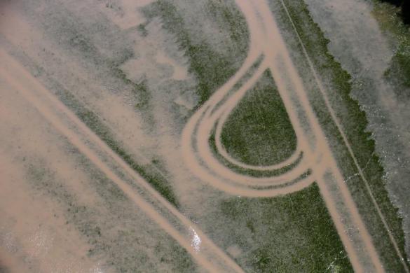 An aerial view shows the waters of the Elbe river inundating agricultural fields during floods near Magdeburg in the federal state of Saxony Anhalt, June 10, 2013. 