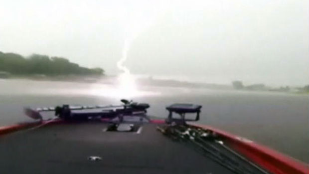 lightning footage, lightning video, lightning sound, lightning almost kills fishermen in Texas, lightning strike almost hist boat in texas