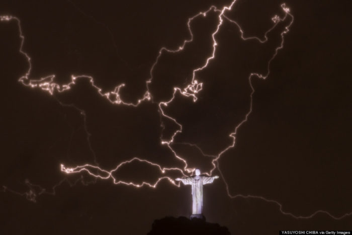 lightning, lightning storm photo, lightning storm rio photo, lightning storm rio photo 2014, lightning storm rio photo january 2014, lightning storm, lightning storm damages christ statue in Rio, lightning storm rio january 2014, christ statue lightning storm january 2014, janauary 2014 lightning storm rio, rio de janeiro christ statue, rio christ statue lightning storm, A lightning flashes over the statue of Christ the Redeemer in Rio, lightning storm rio 2014, A lightning flashes over the statue of Christ the Redeemer on top of the Corcovado hill in Rio de Janeiro, Brazil, on January 16, 2014