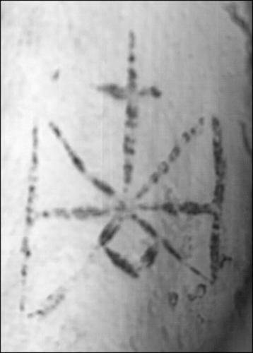 unique christian mummy found in Sudan, unique tattooed christian mummy found in Sudan, unique tattoo found on Sudanese mummy, ancient tottoo of Michael found on 1,300 year-old mummy, unique tattoo on mummy april 2014, Christian tatooed mummy in Sudan April 2014, IR photography of the unique Michael tattoo discovered on the inner thigh of a Christian mummy unearthed in a cemetery along the banks of the Nile in Sudan 