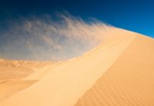 sand dune sound, singing sand, singing sand phenomenon, what is the sound of sand dunes, sand sound