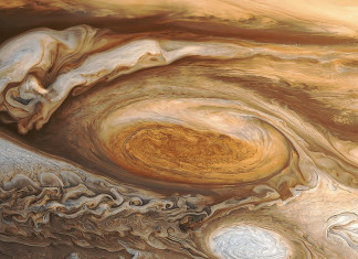 jupiter storm, largest storm in solar system, jupiter cyclone, The Great Red Spot shot by Voyager 1 in 1979 reveals a huge hurricane-like storm in Jupiter’s southern hemisphere. Photo: NASA, amazing spece weather: jupiter's storm, strange space weather: Jupiter cyclone, Deadliest Space Weather - Biggest Storm in the Solar System, Deadliest Space Weather, Biggest Storm in the Solar System