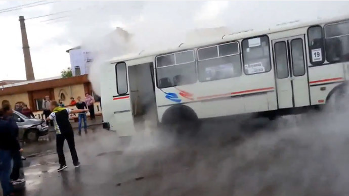 hot geyser hits bus in russia, video of hot water geyser hitting bus and burning passengers may 2014, hot geyser hits bus in Russia video may 2014, Passengers Boiled Alive - Bus Drives Through Boiling Water Geyser. Photo: Youtube screenshot