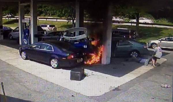 Heroic Gas Station Rescue Police Officer Saves A Man's Life After Gas Station Crash in White Plains (NY), amazing moment provided by the Westchester County Police, Senior State Police Investigator John Vescio is seen at right, pulling a driver from his burning Toyota after it has crashed into the pumps at the Hutchinson River Parkway Mobil gas station in White Plains June 3, 2014. The 69 year-old driver had a medical issue and was trapped inside the car. Westchester County Police, Fiery video: Injured hero 'just reacted' after gas station crash, amazing crash video in gas station in NY, NY gas station fire and rescue video, video gas station rescue by police officer, undercover police officer saves man's life after gas station crash june 2014, gas station crash june 2014 video, video gas station crash NY june 2014