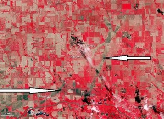 scars left after twin tornado in Pilger, scars in earth left by twin tornadoes in Pilger nebraska june 2014, pilger nebraska twin tornado june 2014, satellite image of scars in the earth of twin tornadoes in Pilger, pilger tornado twin tornadoes scars and path, satellite image showing path of twin tornado Nebraska satellite image, What Are These Two Mysterious Lines Appearing In This Satellite Image Of Nebraska? Image: NASA, nasa earth photo: path left by nebraska twin tornadoes in fields, path of destruction: path of twin tornadoes caught by nasa satellite, What Are These Two Mysterious Lines Appearing In This Satellite Image Of Nebraska? Image: NASA