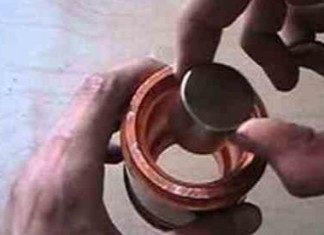strange science: Neodymium magnet in FAT copper pipe, weird science: This Is What Happens When A Magnet Is Dropped Through A Copper Pipe, strange science experiements, most surprising science experiments, most amazing science experiments video, mind-blowing science experiments on video, best weird science videos, I fucking love science videos, I fucking love science best experiments video, Strange physical phenomenon: Lenz's Law explains why a magnet going down a fat copper pipe slows down and spins. Photo: Youtube video