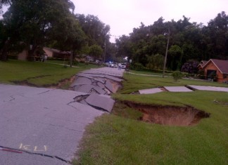 This monster sinkhole in Spring Hill, Florida measures now 40 x 40 yards long and is 30 feet deep. Amazing!, sinkhole, sinkhole formation, us sinkhole july 2014, florida sinkhole july 2014, spring hill giant sinkhole july 19 2014, giant sinkhole spring hill photo, photo of giant sinkhole in spring hill florida july 2014, video giant sinkhole spring hill july 2014, florida sinkhole florida july 2014, new sinkhole florida july 2014, sinkhole florida july 2014, giant sinkhole florida july 2014, giant sinkhole Spring Hill florida