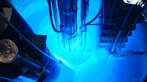 glowing nuclear reactor, nuclear reaction, glowing water during nuclear reaction, water glows during nuclear testing, Glowing neon water during 10'000 nuclear test operation at Sandia Annular Core Research Reactor facility. Photo: Youtube video