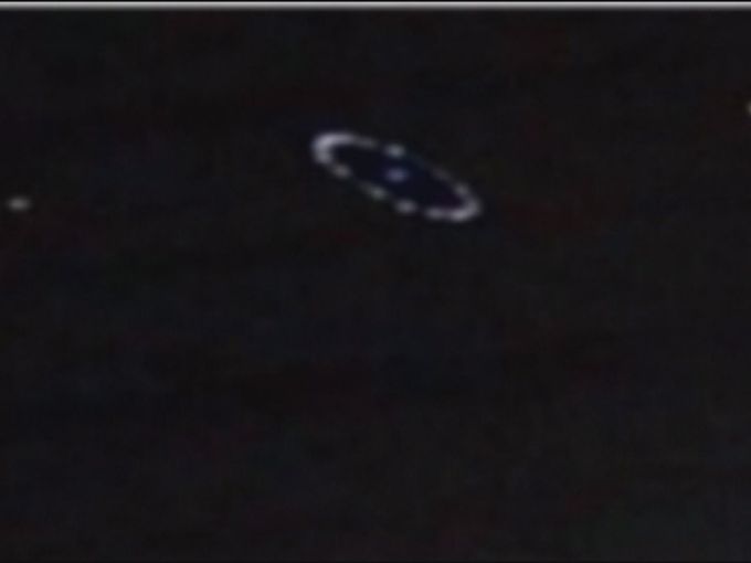 ufo houston, alien invasion houston august 2014, us ufo august 2014, ufo houston photo, us ufo august 2014, strange lights houston august 2014, houston hovering lights august 2014, weird lights over houston august 2014, strange lights float over Houston august 2014, This strange circular light formation was photographed over Houston last Monday evening. Photo: Twitter, Another apocalyptic view of these strange lights in Houston skies during Monday's storms. Photo: Twitter, This alien spaceship is pretty scary! Photo: Twitter