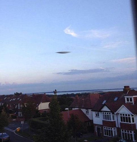 ufo sightings portsmouth alien, Portsmouth has been spooked after a disc-shaped UFO was spotted hovering above houses. Photo: The UFO in the sky taken by Lewis Rogers.