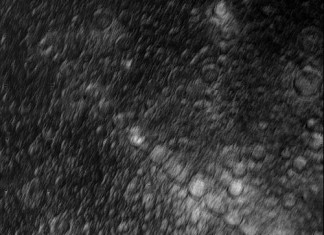 crater chain callisto, callisto crater chain, chain of craters on callisto's surface, What is this mysterious line of crater on the surface of Jupiter's moon Callisto?