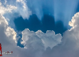 rays and double clouds shadow, double cloud shadow, strange cloud formation, strange clouds, Are these rays and double cloud shadows photographed over Isa Town, Kingdom of Bahrain signs of apocalypse? Photo: Ali Majeed Al-Hajari