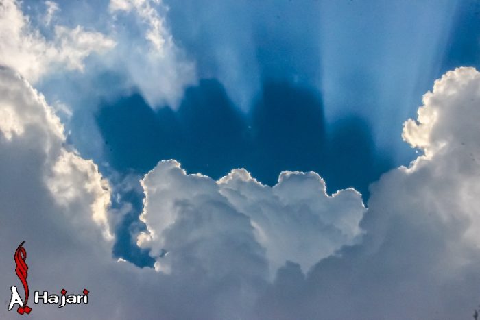 rays and double clouds shadow, double cloud shadow, strange cloud formation, strange clouds, Are these rays and double cloud shadows photographed over Isa Town, Kingdom of Bahrain signs of apocalypse? Photo: Ali Majeed Al-Hajari 