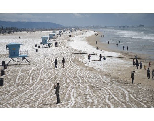 hail huntington beach march 2015 photo and video, snow huntington beach march 2015, hailstorm huntington beach march 2015, snow in huntington beach march 2015 video, snow orange county march 2015, A chilly storm blew in hail pellets near the Huntington Beach Pier.
