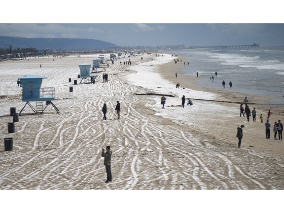 hail huntington beach march 2015 photo and video, snow huntington beach march 2015, hailstorm huntington beach march 2015, snow in huntington beach march 2015 video, snow orange county march 2015, A chilly storm blew in hail pellets near the Huntington Beach Pier. 