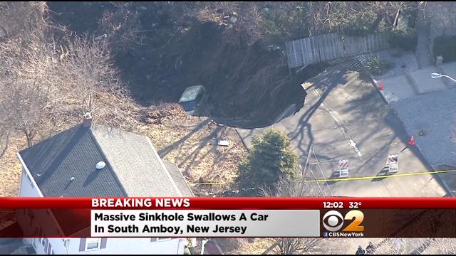 sinkhole south amboy, sinkhole south amboy video, south amboy sinkhole, Homes Evacuated After Huge Sinkhole Opens Up In South Amboy, Street Collapse In South Amboy, giant sinkhole swallows car in south amboy NJ, NJ sinkhole south amboy march 2015, giant sinkhole collapses under car in south amboy NJ video