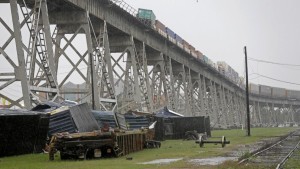 Strong winds blow train cars off bridge louisiana, Strong winds blow train cars off bridge video, Strong winds blow train cars off bridge video and photo, Strong winds knocked over some train cars in Jefferson Parish, train derailment jefferson parish, strong winds knock off train from suspended tracks, louisiana train knocked down track, 