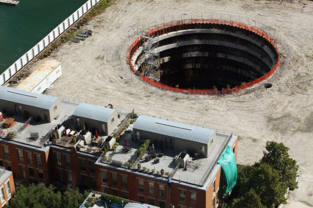spire chicago hole, 76-Foot-Deep Hole in Chicago, Chicago most famous hole in the ground, giant hole chicago, chicago deep hole, chicago downtown hole, No One Knows What to Do With This 76-Foot-Deep Hole in Chicago, deep hole chicago spire, spire giant hole chicago, 
