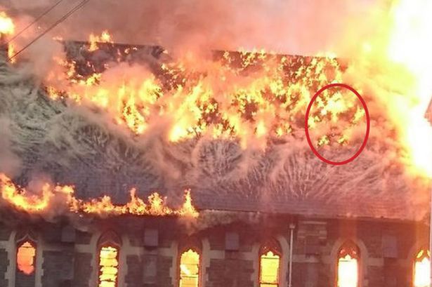 face church fire, Can you see the faces in this church inferno?, burning church face, face during church fire, face observed in flaming church, face church blaze, pareidolia, pareidolia example