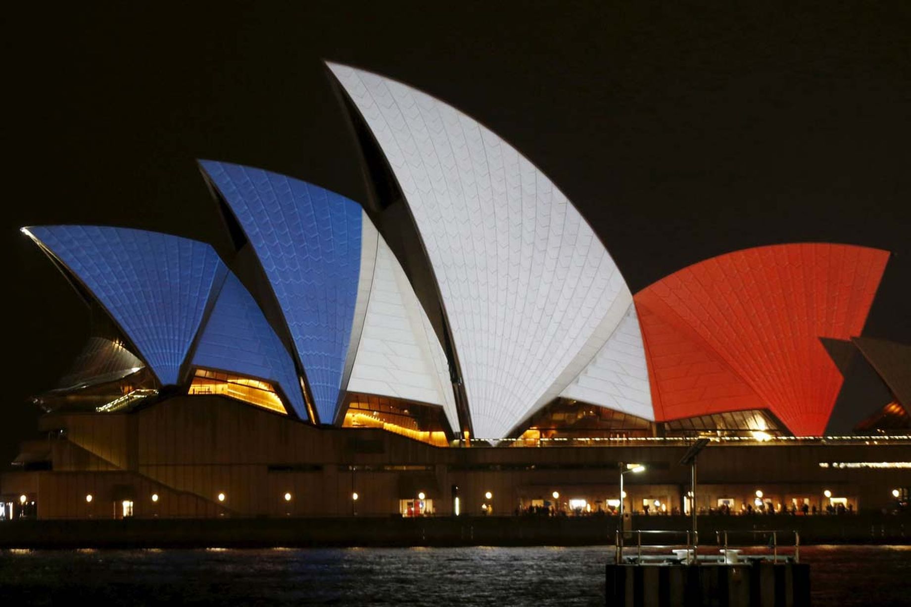 paris terror attacks pictures, paris terror attacks solidarity, paris terror attacks solidarity around the world, paris terror attacks landmarks solidarity pictures, terror attack paris november 2015, lights of solidarity paris terror attacks, The lights of the Eiffel Tower are off following the terror attacks., Paris terror attacks: World landmarks light up in show of unity with France following deadly atrocities, Sydney Opera House lit up in blue, white and red as world cities adopt the Tricolore