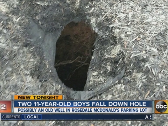 two boys swallowed by sinkhole in rosedale maryland, two boys fall down hole in rosedale maryland, 2 boys fall in hole rosedale maryland, 2 boys sinkhole mcdonald rosedale maryland