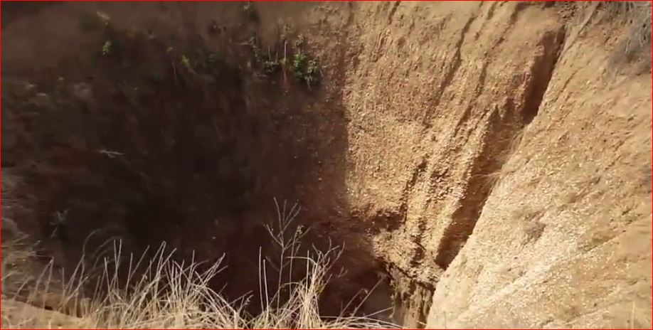 giant sinkhole gurbuki, giant sinkhole gurbuki russia, giant sinkhole gurbuki russia april 2016, giant sinkhole russia gurbuki video, giant sinkhole russia