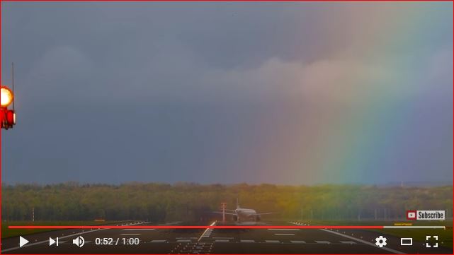 plane landing rainbow germany, germania airplane landing in rainbow, rainbow plane video, plane landing in rainbow video