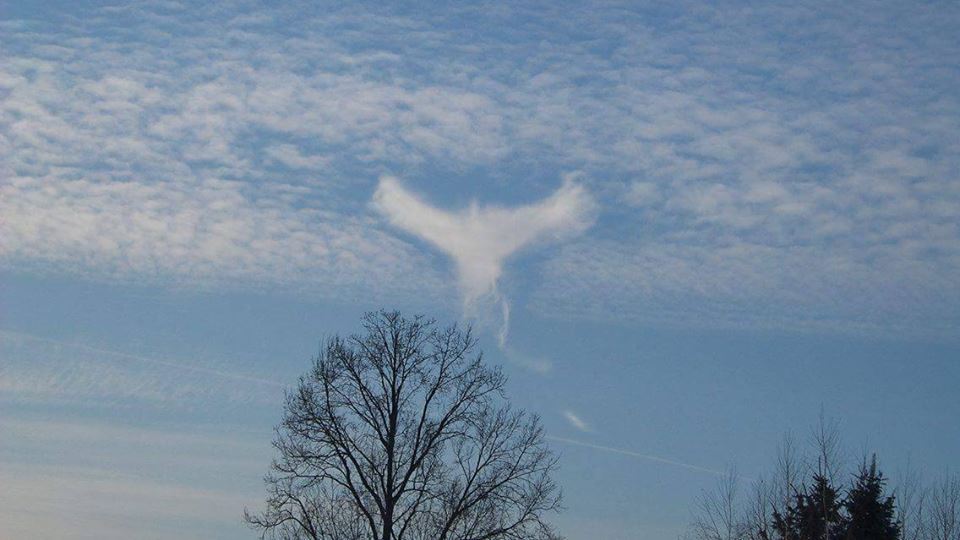 angel cloud poland, strange angel cloud, strange angel cloud poland, strange bird cloud poland, A weird cloud looking like an angel or a bird formed in the sky over Poland on December 18
