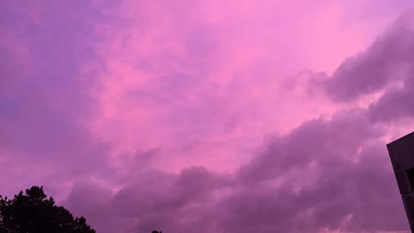 purple sky houston, magenta sky houston, pink sky houston, Purple rain: Thunderstorms turn Houston sky to vivid shades pink and purple