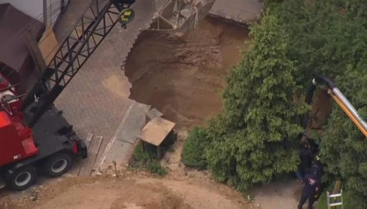 Gigantic Sinkhole Swallows Man Alive After Cesspool Collapse in Long Island Yard, huntington giant sinkhole cesspool, huntington sinkhole, huntington sinkhole video