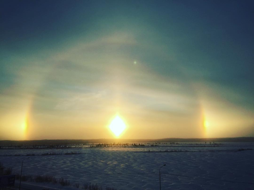 Surreal sun dog phenomenon lights up the sky of western Siberia in