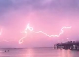 lightning sky pink adelaide australia video, lightning turns sky pink australia, sky turns pink after lightning australia, australia lightning adelaide pink sky, pink sky lightning adelaide