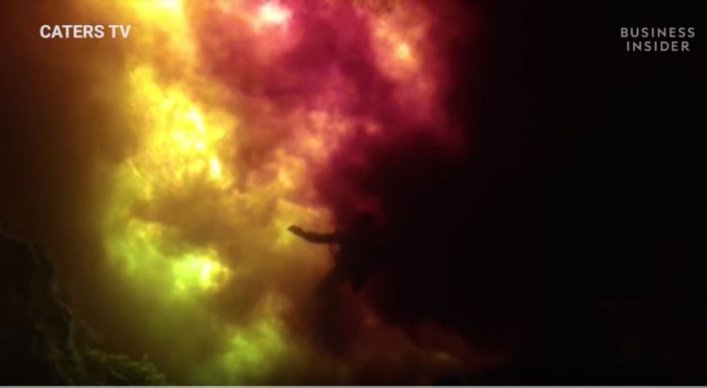 diver swimms in fire florida video