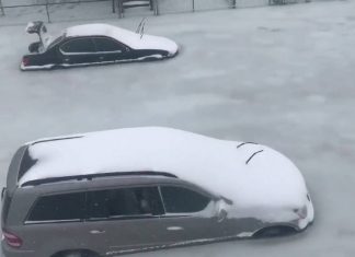 flooding massachusetts, bomb cyclone floos massachusetts freeze, cars trapped in ice after flooding waters freeze in Severe, Massachusetts, Storm surge freezes in Severe, MA, trapping hundreds of cars in ice