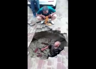 man swallowed by sinkhole china july 2018, sinkhole swallows man china video