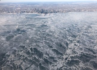 lake michigan frozen, frozen lake michigan, lake michigan freezes during polar vortex