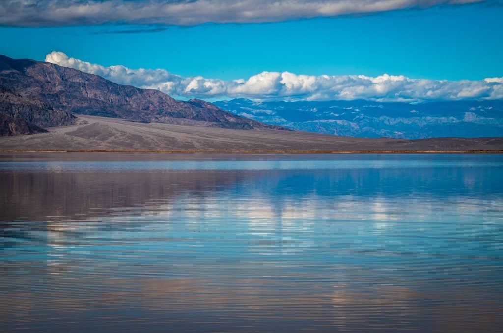 death valley lake march 2019, Rare 10-mile-long lake forms in Death Valley after heavy rains and flooding in March 2019, Rare 10-mile-long lake forms in Death Valley after heavy rains and flooding in March 2019 pictures, Rare 10-mile-long lake forms in Death Valley after heavy rains and flooding in March 2019 video