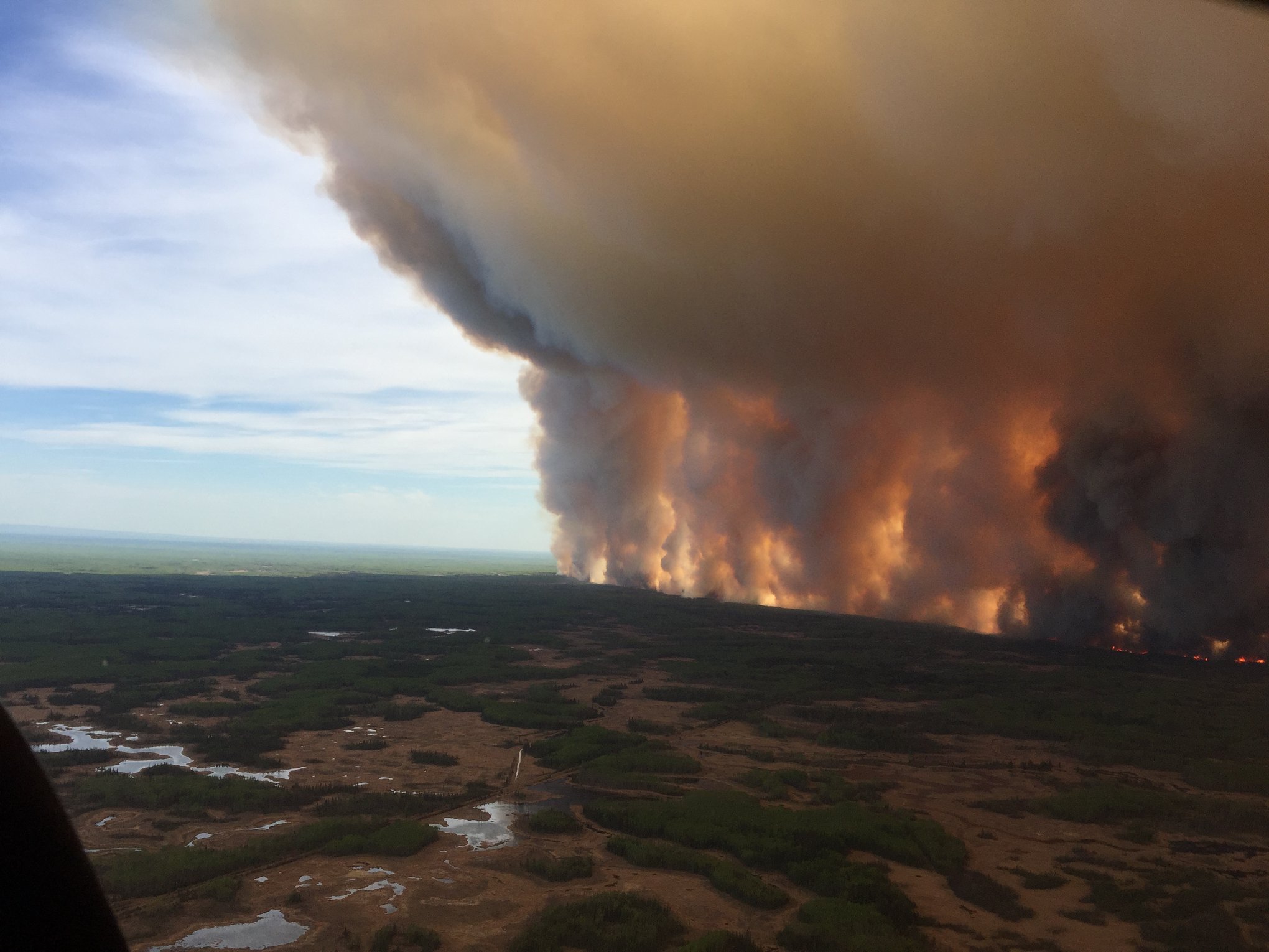 Chuckegg Creek wildfire burns out of control in Alberta, Canada