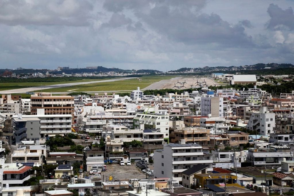 A view of Marine Corps Air Station Futenma, which is next to a residential area and has been at the center of controversy in Okinawa over claims of water contamination, okinawa water contamination pfas, drinking water contamination us army okinawa japan