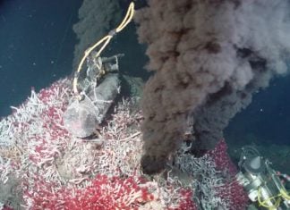 ocean water level sinks, Every year, billions of gallons of ocean water fall into the Earth at tectonic plate boundaries, then gush back out at hydrothermal vents like the one seen here. A new study shows that this deep water cycle may contribute to hundreds of feet of sea level loss over time