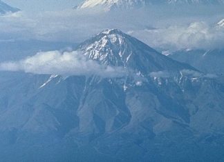 Extinct volcano has woken up and scientists say it could erupt 'at any moment' in a Pompeii-like explosion, russian volcano bolshaya udina active again