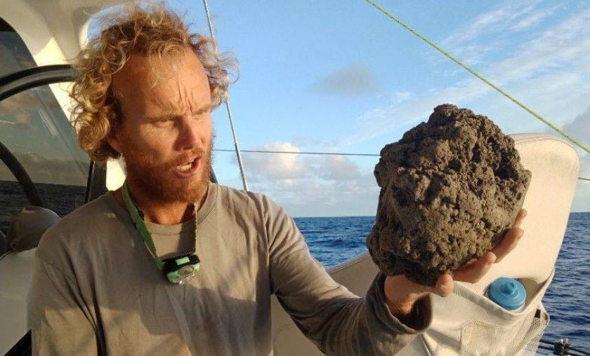 Ash and volcanic rock cover the ocean near Tonga after underwater volcanic eruption on August 7, ash and volcanic rock cover ocean near tonga video, ash and volcanic rock cover ocean near tonga pictures