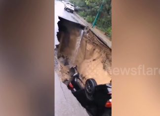 sinkhole swallows two cars, sinkhole swallows two cars video