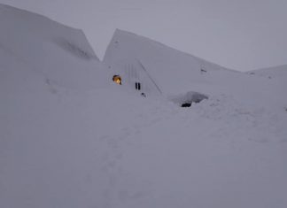 Two-story building buried under snow in Iceland, Two-story building buried under snow in Iceland video, Two-story building buried under snow in Iceland picture