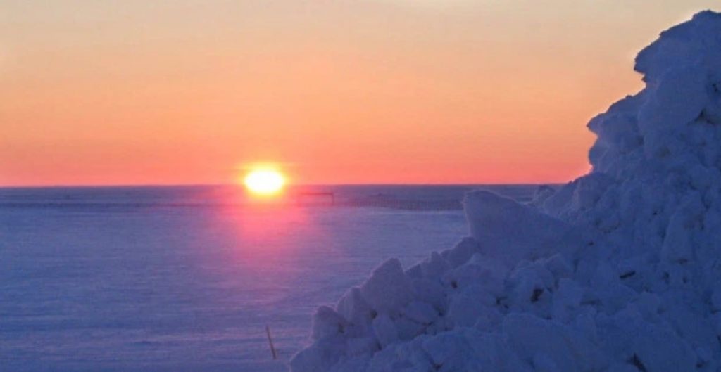 The sun rises over the ice near Barrow, Alaska, for the first time in 66 days Friday, Jan. 23, 2004. (AP Photo/Earl Finkler)